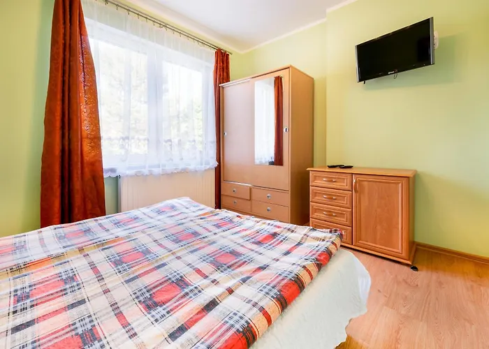 Δωμάτια σε οικογενειακή κατοικία Ewa