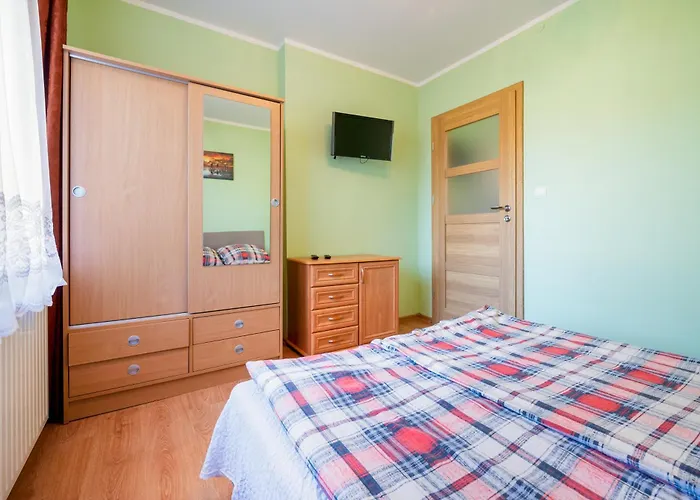 Δωμάτια σε οικογενειακή κατοικία Ewa