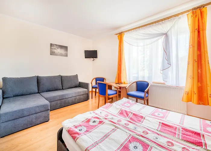 Δωμάτια σε οικογενειακή κατοικία Ewa *