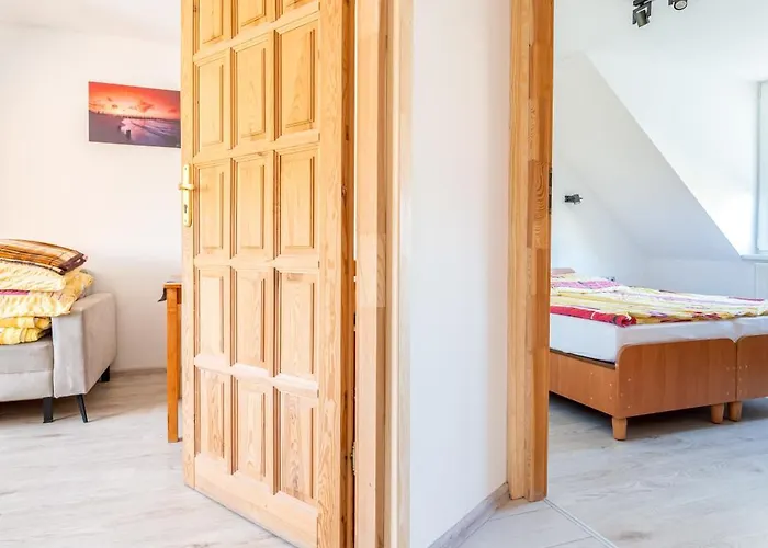 Δωμάτια σε οικογενειακή κατοικία Ewa