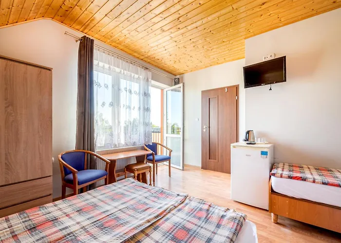 Δωμάτια σε οικογενειακή κατοικία Ewa